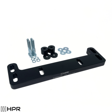 BMW E34 transmission crossmember with bolts and hardware included in the kit.